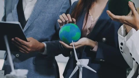 Group of alternative energy engineers discussing a project with a worker du.. Stock Footage 334138266