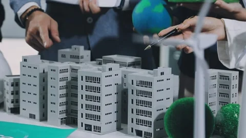 Group of alternative energy engineers discussing a project with a worker du.. Stock Footage 334138277