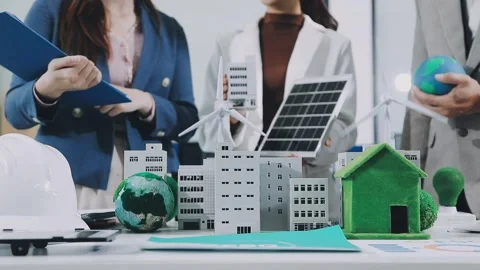 Group of alternative energy engineers discussing a project with a worker du.. Stock Footage 334138310
