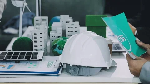 Group of alternative energy engineers discussing a project with a worker du.. Stock Footage 334138338