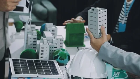 Group of alternative energy engineers discussing a project with a worker du.. Stock Footage 334138342