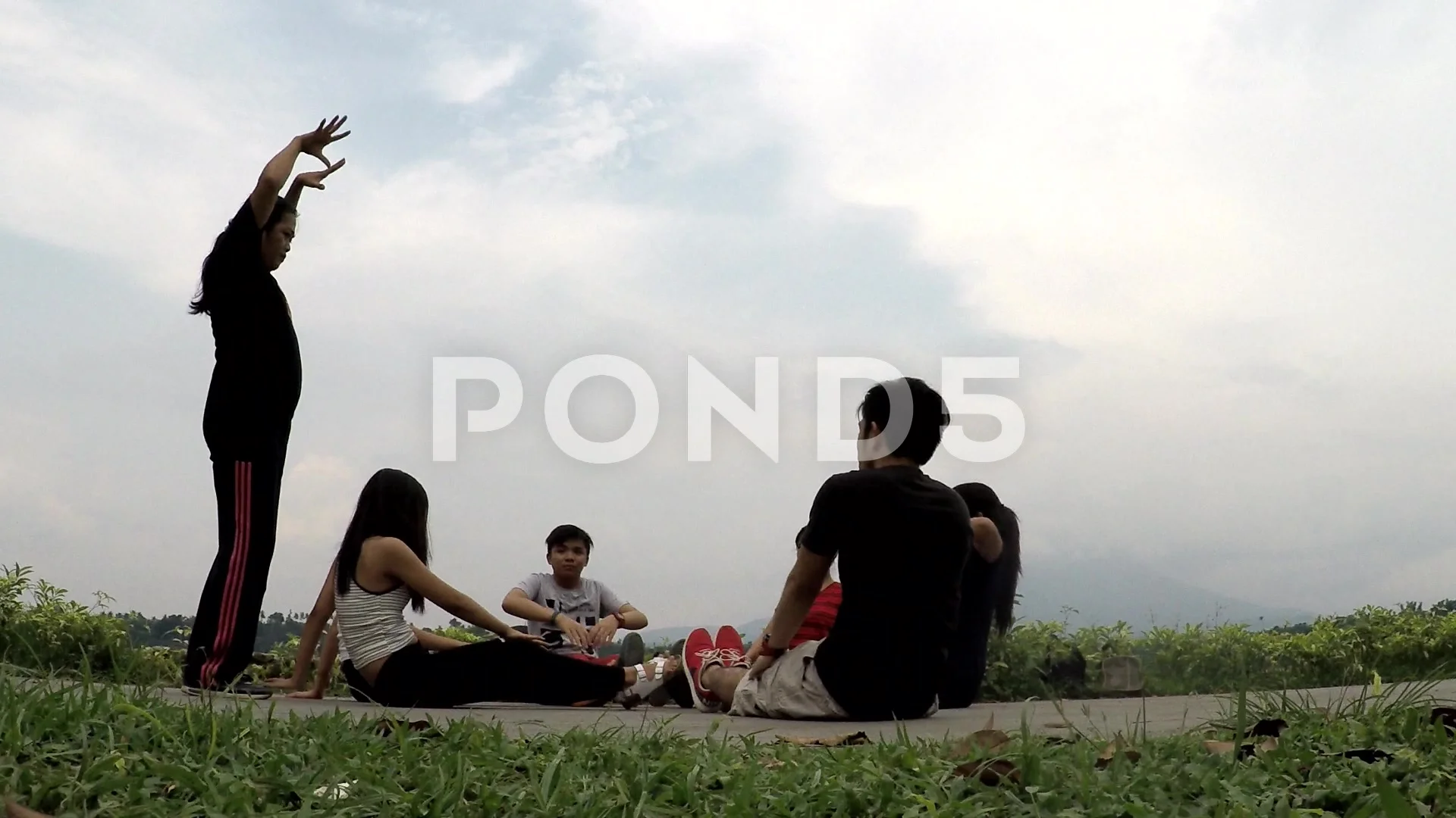 Group Of amateur teen students are taught dancing