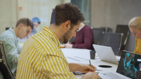 Group of analysts working in office Video stock 132941966