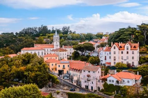 Group of ancient buildings in a village surrounded by forest. Stock Photos