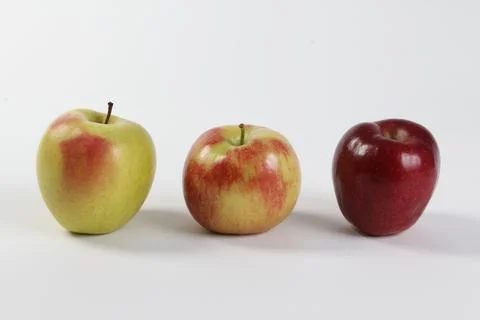 Group of Apples on white background Stock Photos