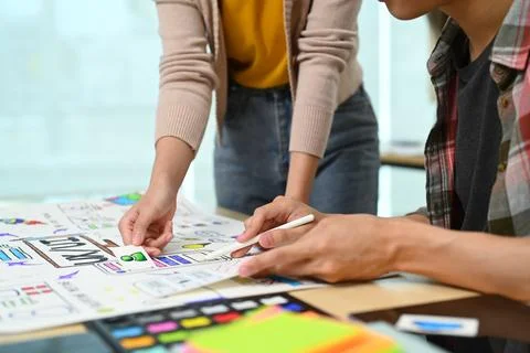 Group of application developers working on new website wireframe, planning Stock Photos