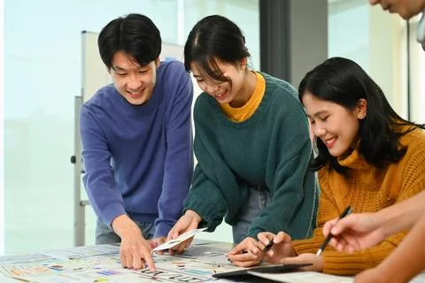 Group of application developers working on new website wireframe, planning Stock Photos