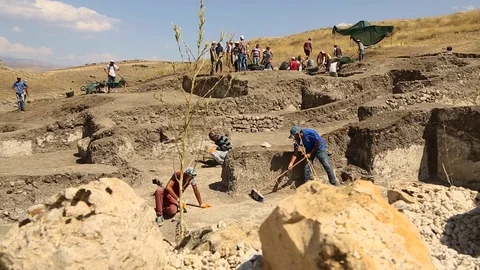 Group Of Archaeologist Explore Ruins Stock Footage 83990497