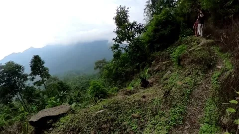 A group of archaeologists are walking on the edge of a cliff Video stock 278960403