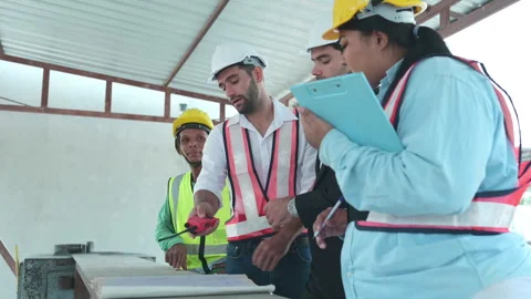 Group of architects, construction foremen, and construction engineers Video stock 255352252