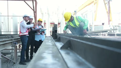 Group of architects, construction foremen, Stock Footage 255354605