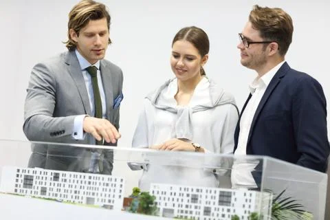 Group of architects sharing their ideas Stockfoto's