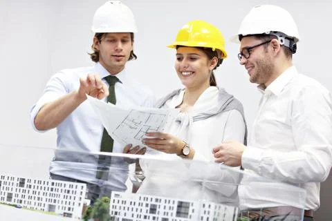Group of architects sharing their ideas Stockfoto's