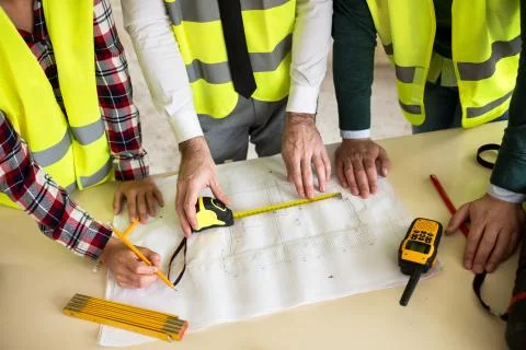 Group of architects working on a project Stock Photos