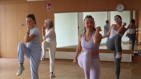 Group are practising arch movement in step jazz dance in fitness-gym Stock Footage 254379016