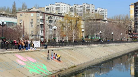 Group of artists painted on the waterfront Easter basket  Video stock 49663680