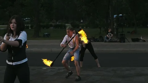 Group of artists performing fire show near VDNH. Stock Footage 109122955