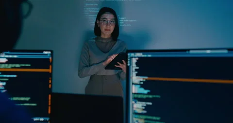 Group Asia female software developer mentor leader manager talk strat prompt AI. Stock Footage 312200439