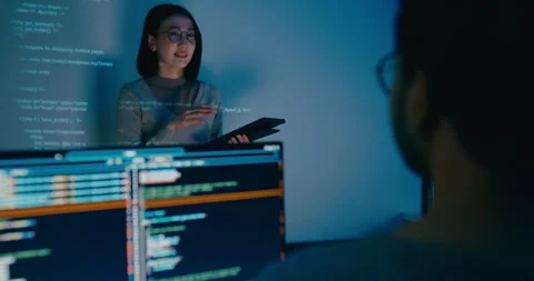 Group Asia female software developer mentor leader manager talk strat prompt AI. Stock Footage 312201428