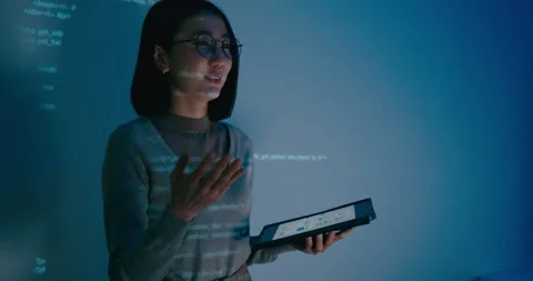 Group Asia female software developer mentor leader manager talk strat prompt AI. Stock Footage 312201451