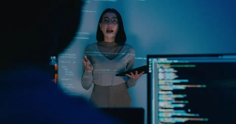 Group Asia female software developer mentor leader manager talk strat prompt AI. Stock Footage 312202018