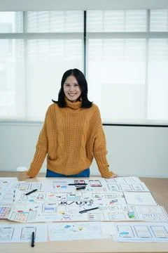 Group of asian creative team programing designers participate in all phases of Stock Photos