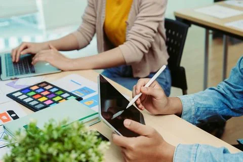 Group of asian creative team programing designers participate in all phases of Stock Photos