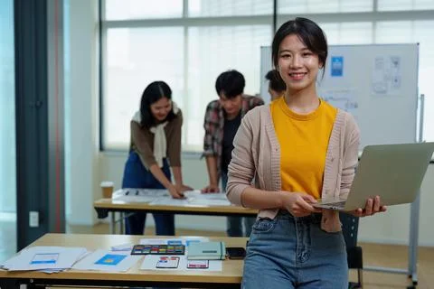 Group of asian creative team programing designers participate in all phases of Stock Photos