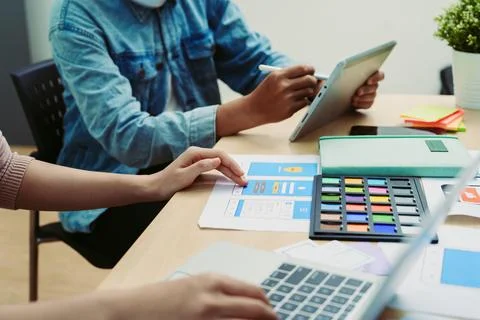 Group of asian creative team programing designers participate in all phases of Stock Photos