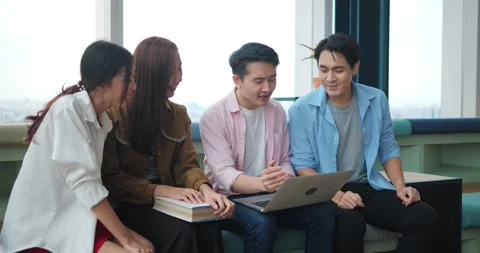 A group of Asian high school students meets in an office boardroom Stock Footage 169557991