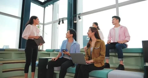 Group of Asian high school students building and programming electric toys Stock Footage 211415606