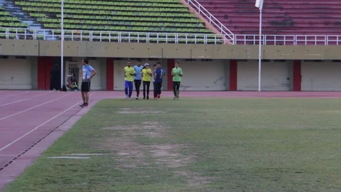 Group of athletes jogging during a training session Stock Footage 86633913