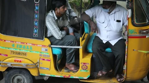 Group-of-auto-rickshaw-drivers-talking Stock Footage 141638041