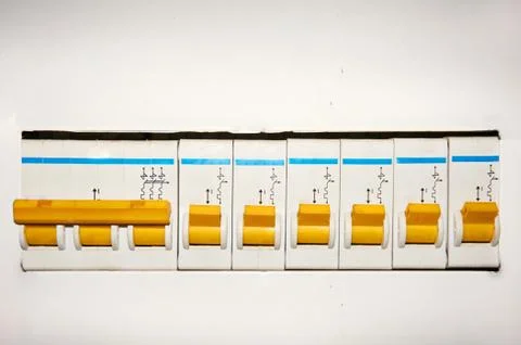 Group of automatic electrical switches on a white background. Stock Photos