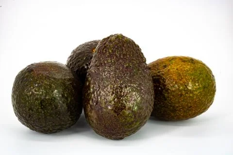 Group of avocados in composition Stock Photos