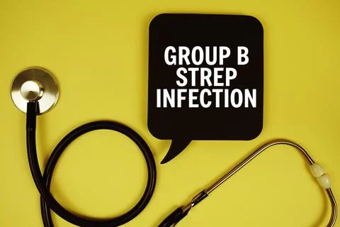 Group B Strep Infection text on speech bubble with stethoscope on yellow ba.. Stock Photos
