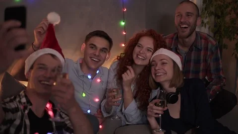 Group of beautiful young people doing selfie in decorated room, best friends Stock Footage 119338923