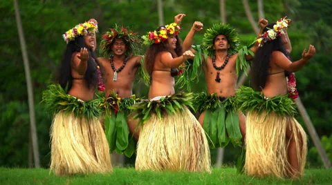 Group of beautiful young synchronized Polynesian male and female dancers Stock Footage 68074362
