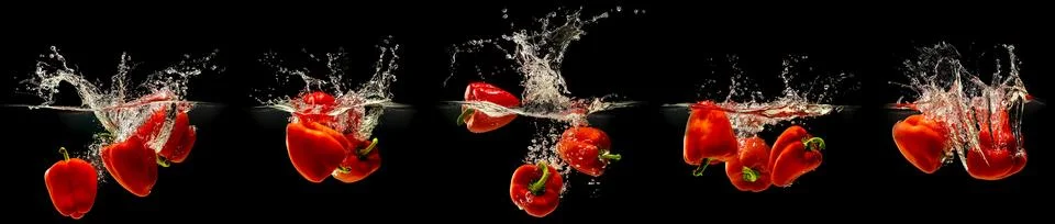 Group of bell pepper falling in water with splash on black background Illustrazione stock