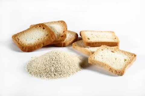 Group biscuits and bread crumbs on white Stock Photos