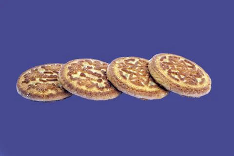 Group of biscuits on dark blue background Stock Photos