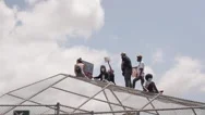 Group Of Black Lives Matter Protestors Cheer From Top Of Backstop, Slow Stock Footage