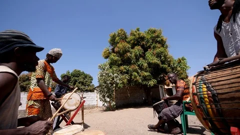 Group of black men playing various african instruments together Video stock 113167057