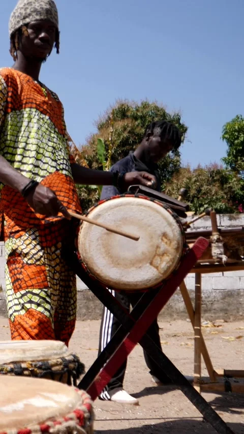 Group of black men playing various african instruments together Stock Footage 230664319