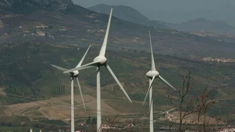 Group of blades of a wind power plant moving under a light wind Stock Footage 87142004