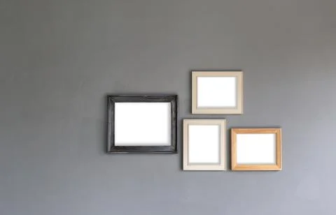 Group of Blank photo frames on the wall for your design Stockfoto's