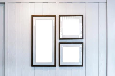 Group of Blank photo frames on the wall for your design, Mock up concept 写真素材