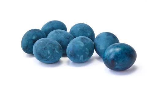 Group of blue painted eggs on a white background Stock Photos