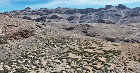 A group of blue sheep roaming on the rugged mountain slopes Stock Footage 274178652