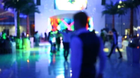 Group of blurred people dancing in a dark banquet hall for a wedding reception Stock Footage 62322625